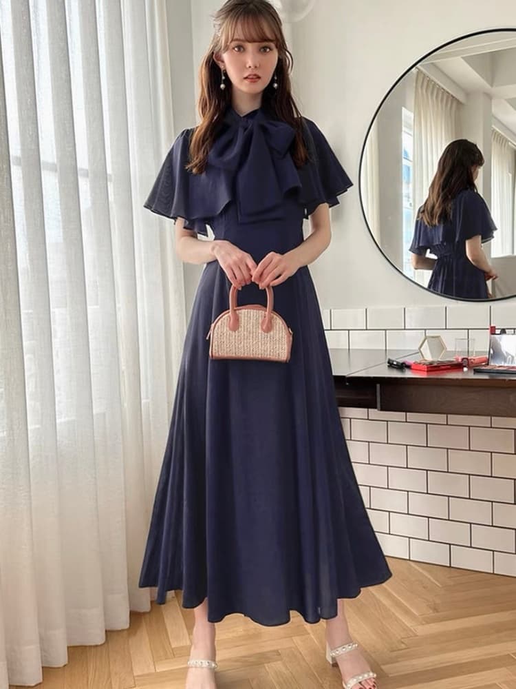 結婚式お呼ばれドレス 大きなリボンがアクセント ケープデザインのシンプルワンピースドレス